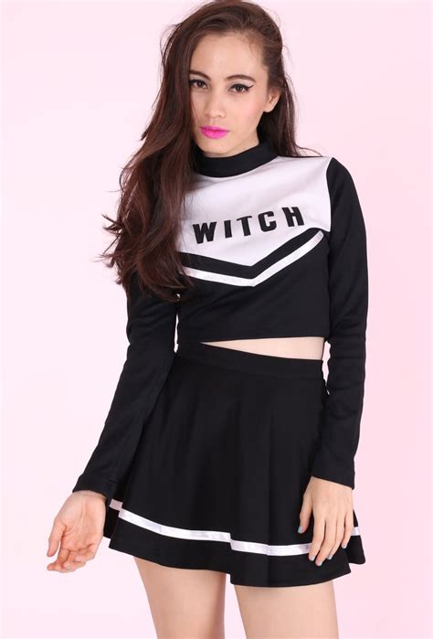 Witchcraft themed cheerleader attire